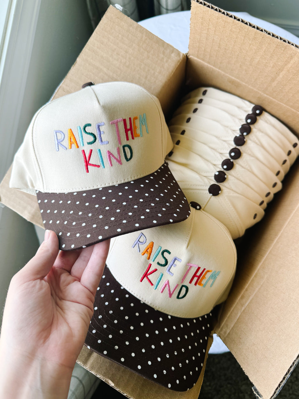 Raise Them Kind Trucker Hat