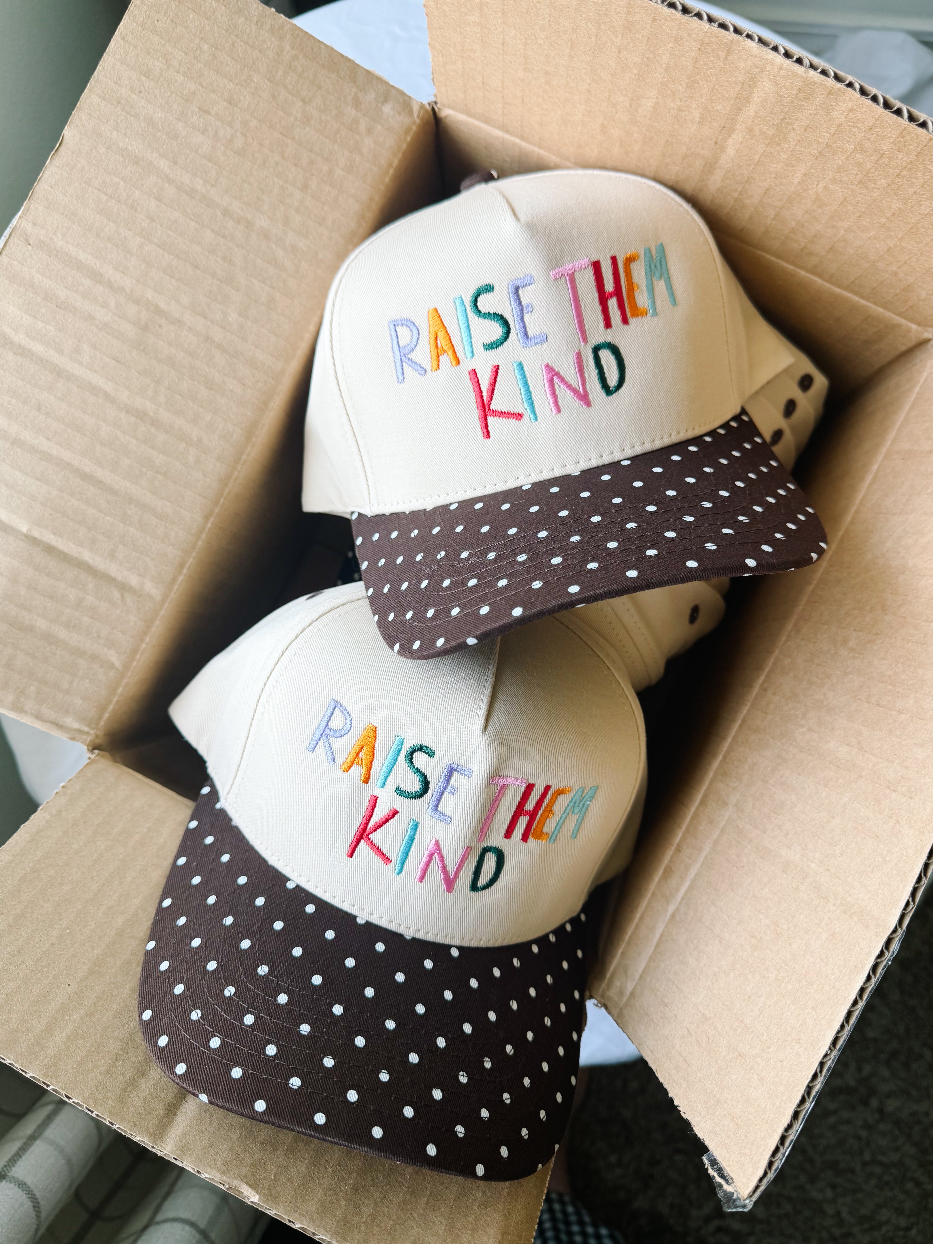 Raise Them Kind Trucker Hat